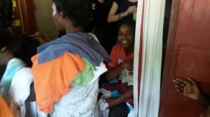 Handing Out Clothing to Those in Need