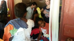 Handing Out Clothing to Those in Need
