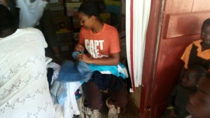 Handing Out Clothing to Those in Need