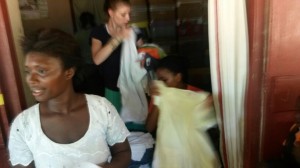 Handing Out Clothing to Those in Need
