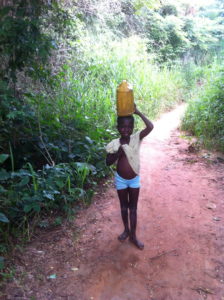 Child Carrying Water Home...