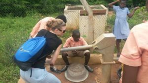 Pumping Water at the Roadside Well