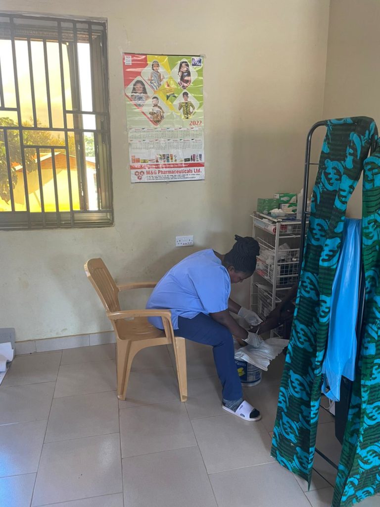 During this Ghana Mission, a medical professional administers First Aid wound care to a villager.  Lesions and infections of the skin are a common issue in the area.