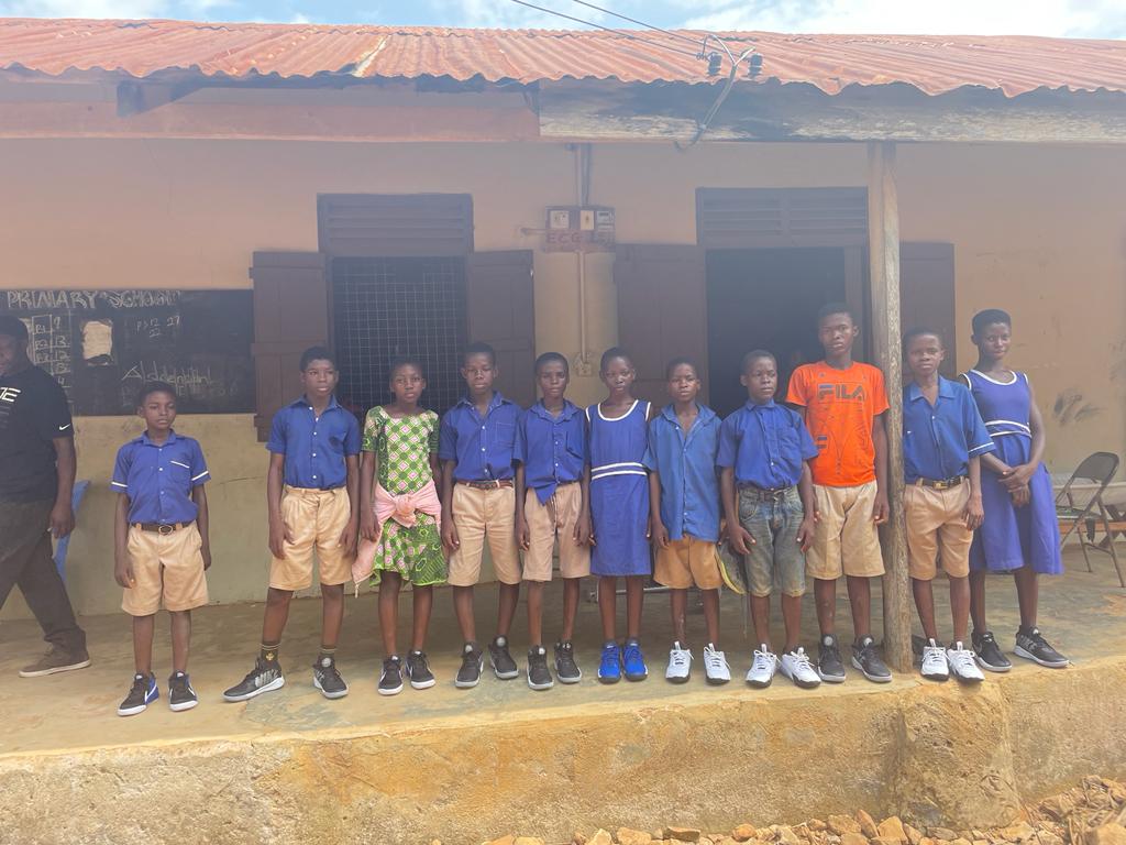 During this Ghana Mission, students are gifted gently-used sneakers so they can walk comfortably to school; many of the students walk far distances to be able to get an education.